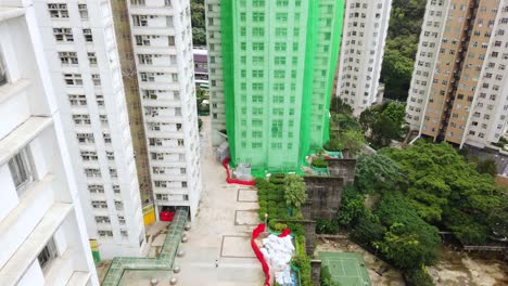 Traditional-Bamboo-Scaffolding-covering-a-new-Downtown-Hong-Kong-residential-skyscraper-Building