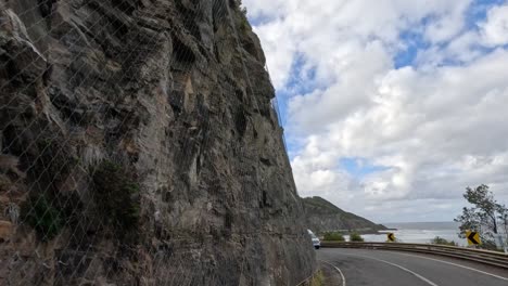 winding road with coastal and cliff views