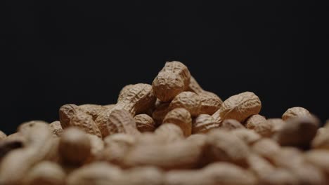 Spinning-pile-of-peanuts-with-black-background-1