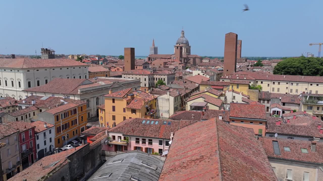 low slow aerial over the Italian town of Mantua. Basilica di Sant'Andrea and the Castello di San Giorgio in view in the direction of the flight