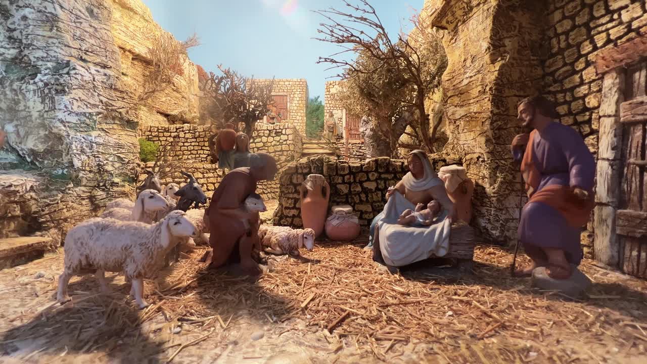 representación moderna de navidad de la escena religiosa con figurillas pintadas de la natividad de josé y la virgen maría