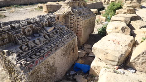 roman carvings on stone in ancient town of sufetula in tunisia