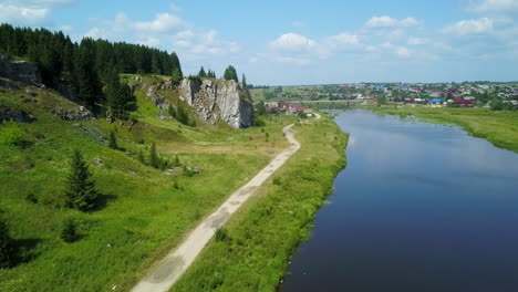 rustic river valley landscape with cliffside