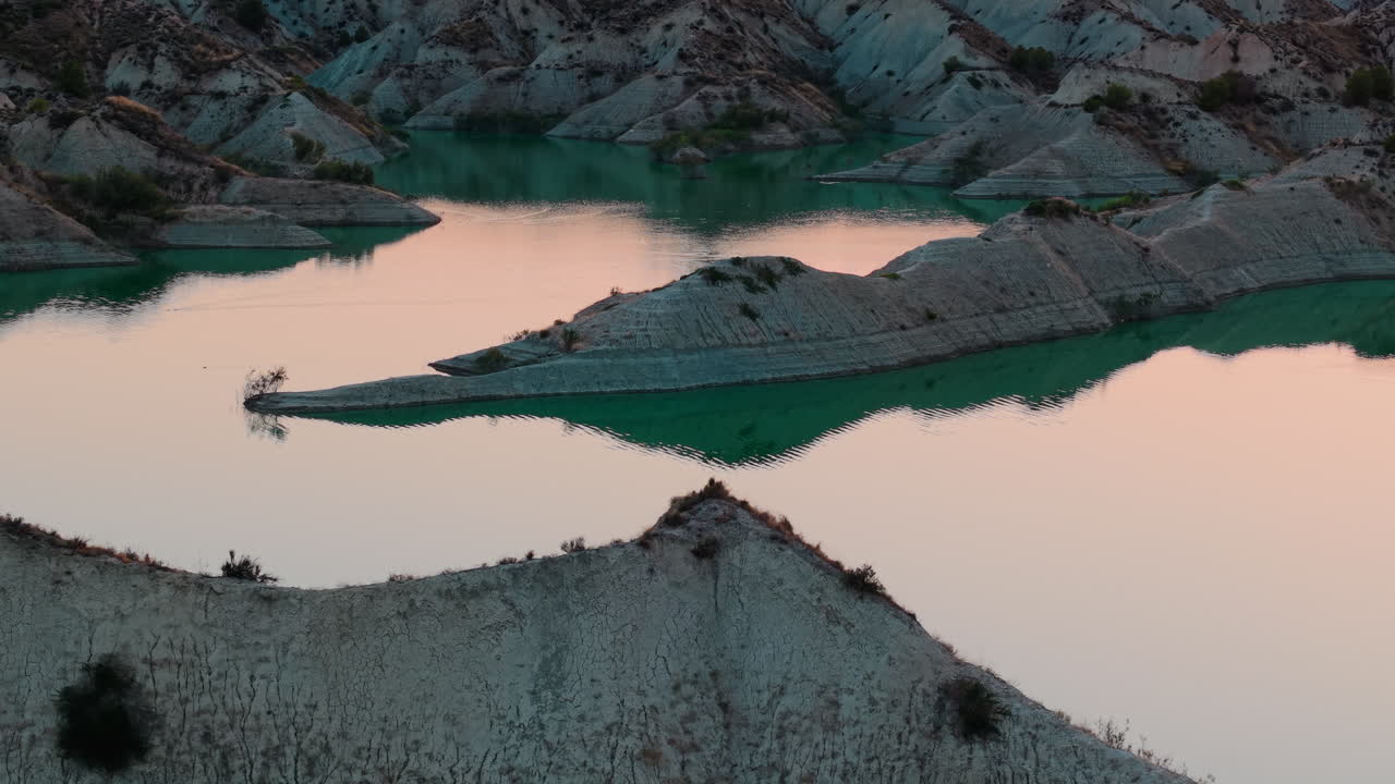 Serene Lake Landscape with Eroded Mountains