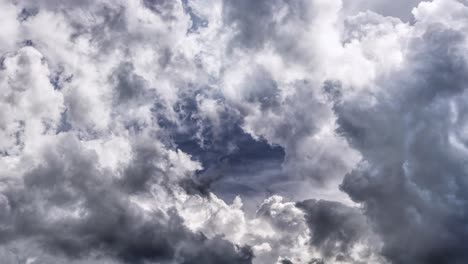 a thunderstorm that flashed inside the thick clouds