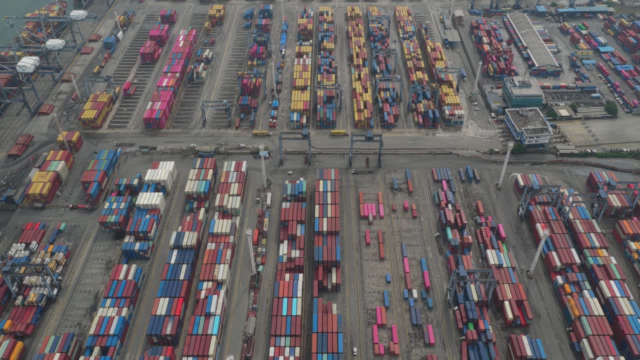 Vertical aerial of container stacks at busy seaport in Jakarta, Indonesia