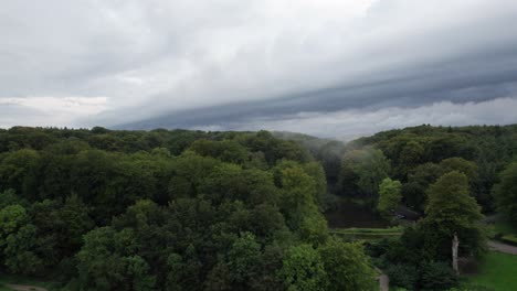 Aerial-View-of-Forest,-Sea,-and-beach-at-Marselisborg,-Aarhus,-Denmark