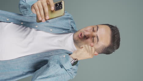 Vertical-video-of-Man-receiving-gospel-on-the-phone.