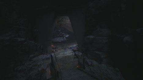 mysterious cave entrance illuminated by flickering light in ancient terrain