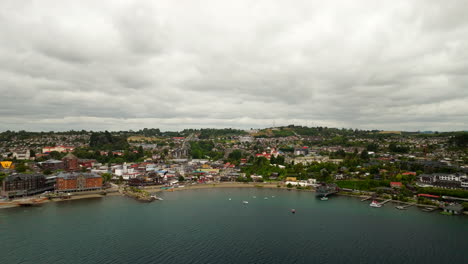 puerto varas waterfront aerial view, vehicle traffic, boating docks