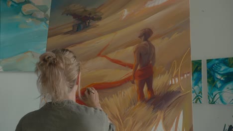 woman artist painting a landscape with a figure