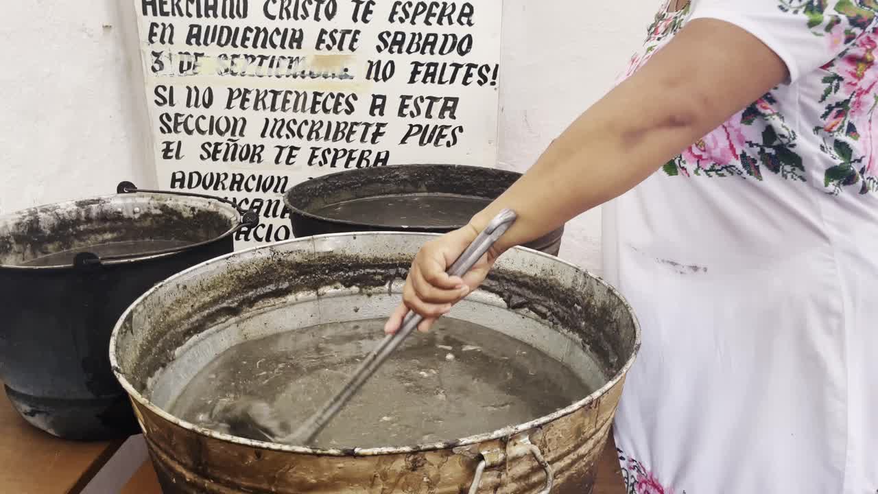 chef kitchen preparation of Yucatan mexico traditional food called "relleno negro