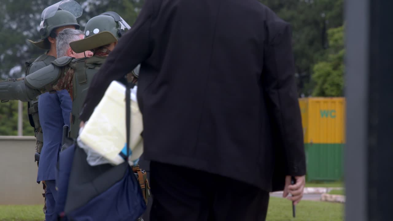 Security Personnel and Officials Meeting Outdoors