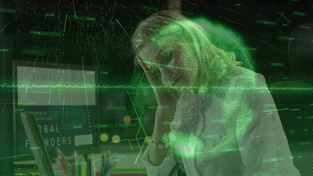 Processing digital data, woman in office with animation overlay on screen
