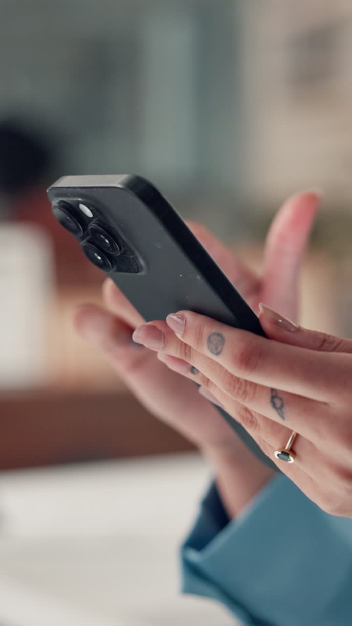 Close-up of Person's Hands Using a Modern Smartphone