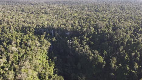 Aerial-view-of-Salto-Arrechea-Fall-surrounded-by-of-Iguazu-Jungle-in-sunlight---Vegetated-Botanical-Landscape-in-South-America