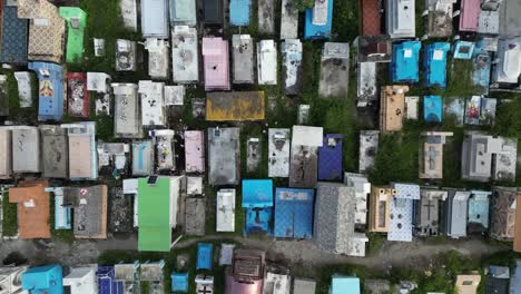 drone footage of a cemetery in dili nestled within a lush tropical landscape