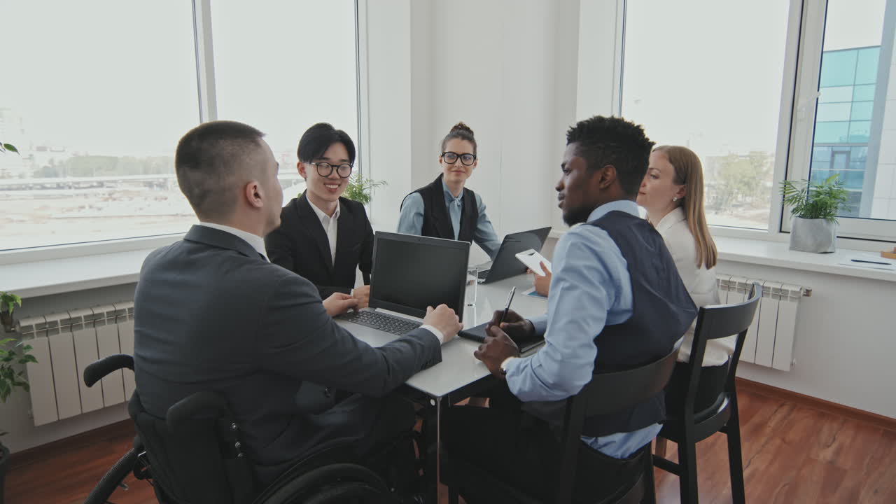 Businessman Having Meeting with Colleagues