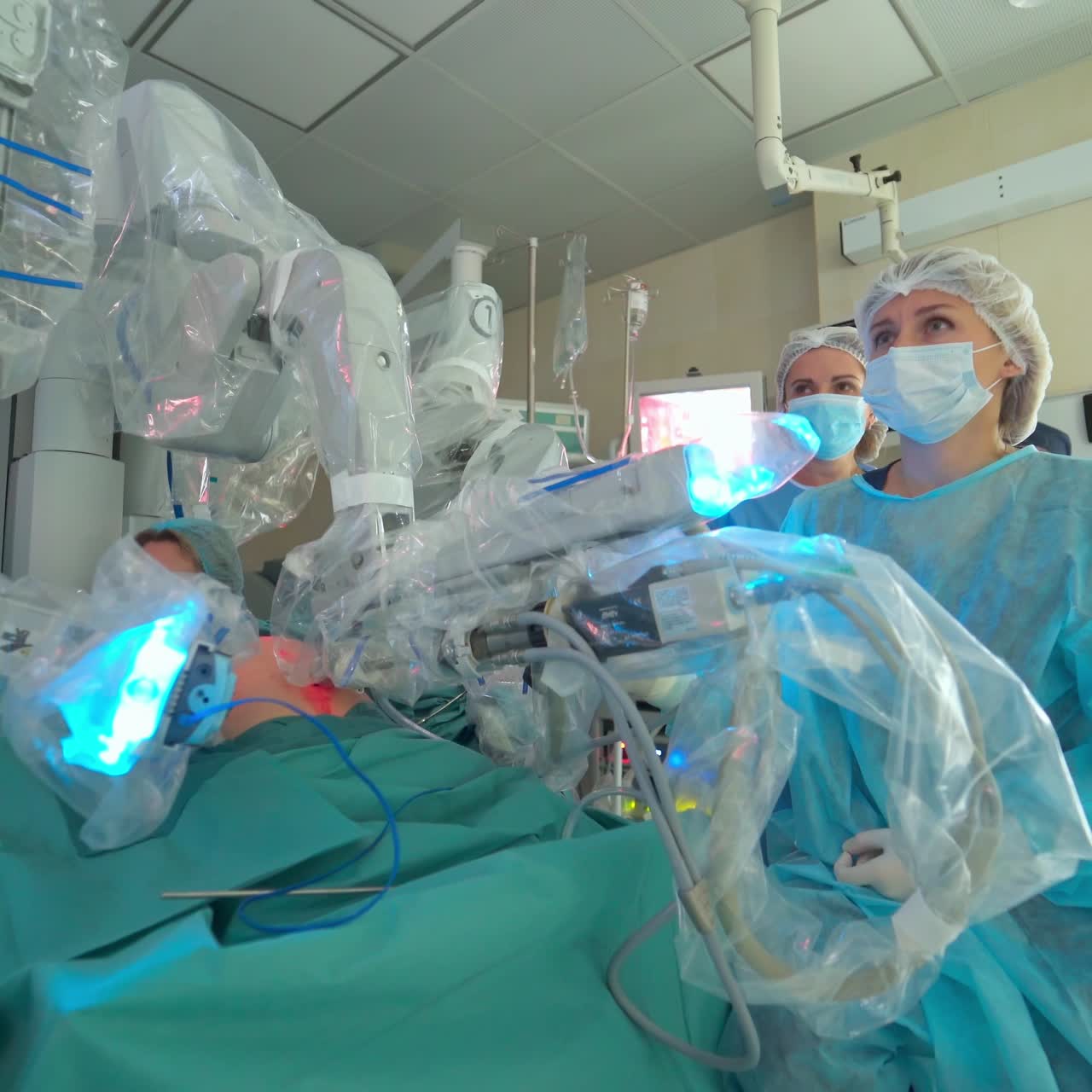 Machine arm surgeon in futuristic room. Medical surgical room healthcare intelligence in hospital with robotic innovation technology equipment