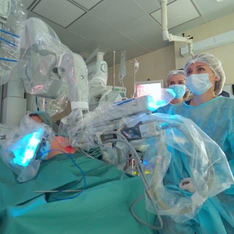 machine arm surgeon in futuristic room. medical surgical room healthcare intelligence in hospital with robotic innovation technology equipment