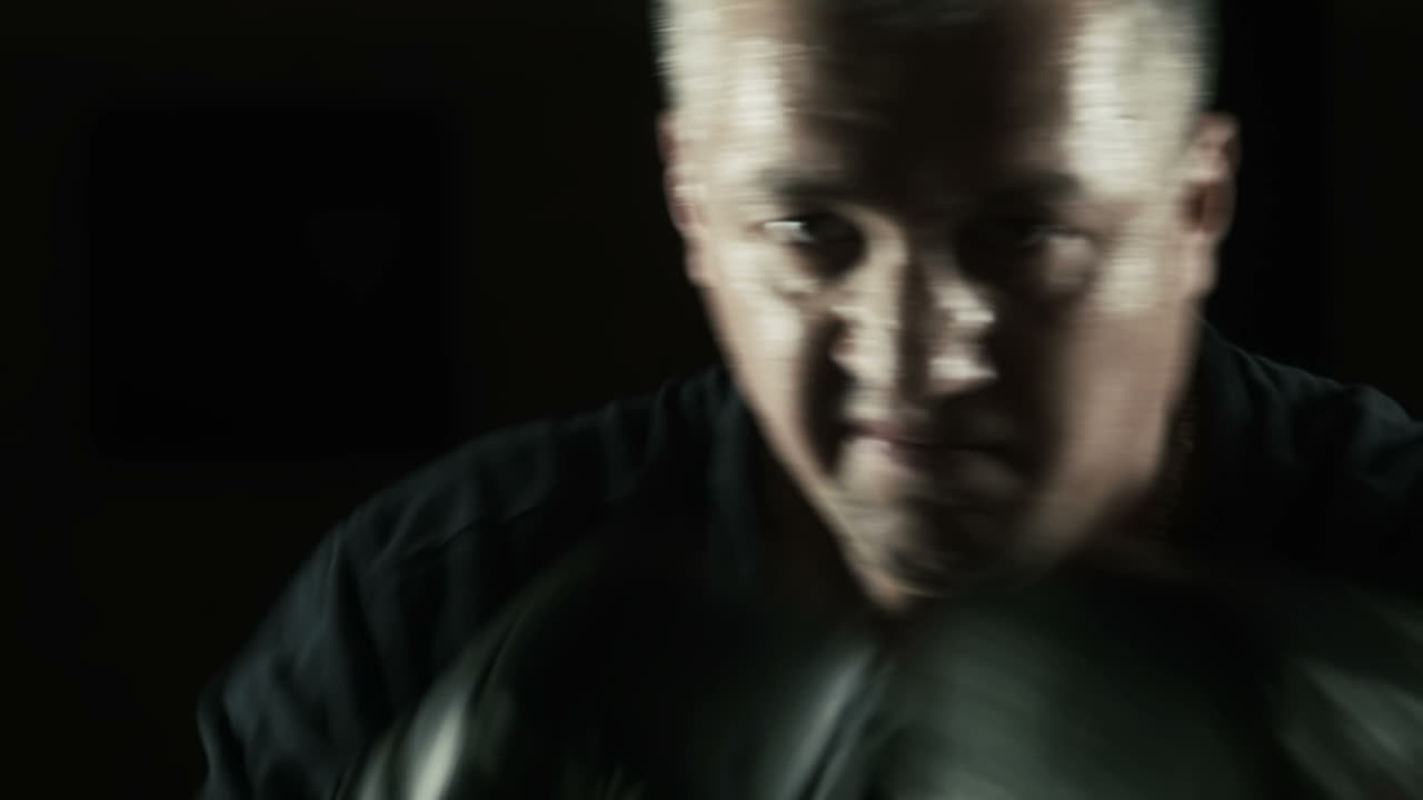 Boxer With Sweaty Face Pose On The Camera