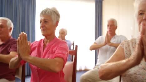 group of senior people exercising