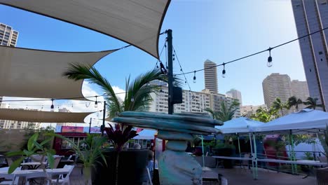 pau hana place restaurant with open seating, light and live music in waikiki area, honolulu, oahu, hawaii