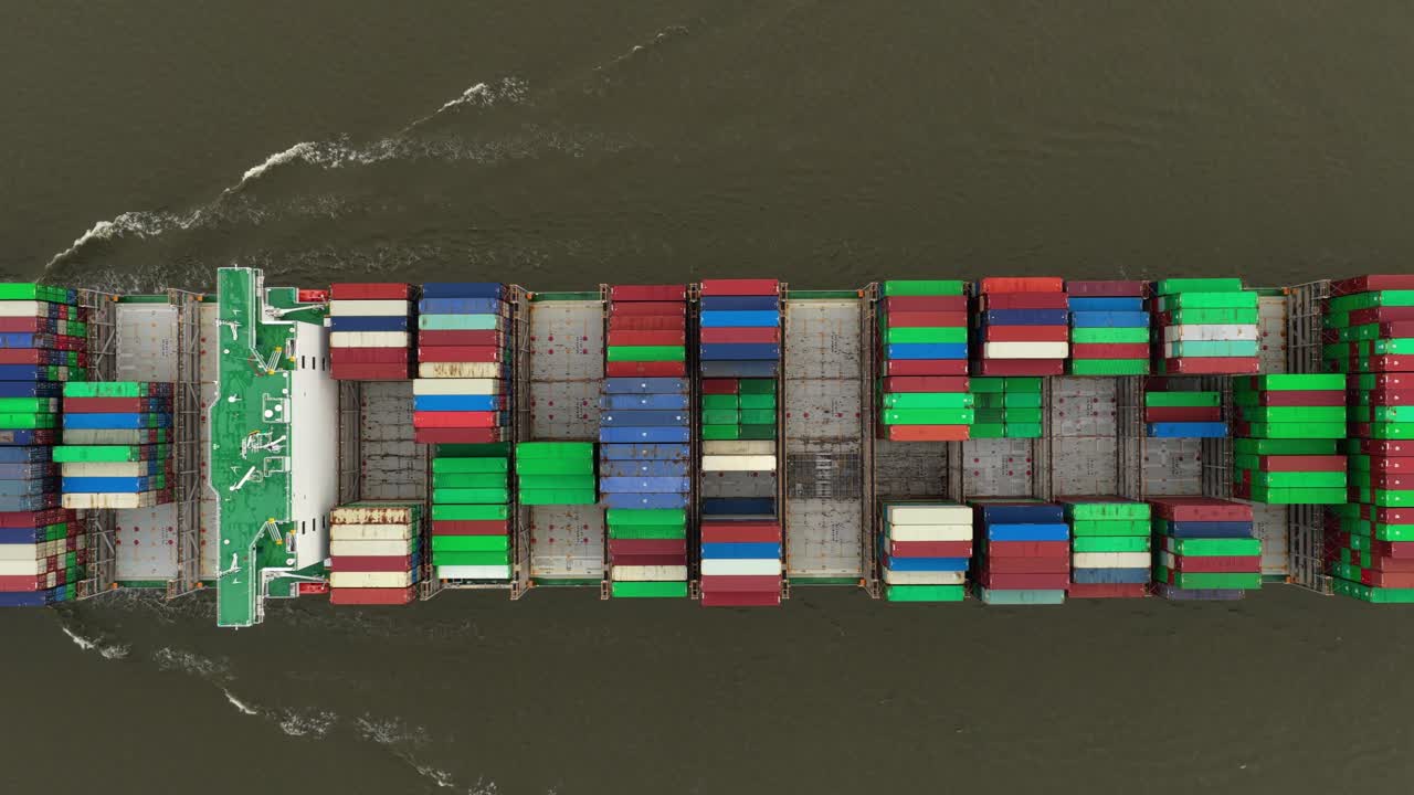 Freight ships from above on Germany Elbe River, delivering goods