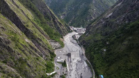the aerial view shows the rasuwagadhi flood destroying a friendship bridge, road, a hydropower substation, and sweeping away vehicles in rasuwa, nepal