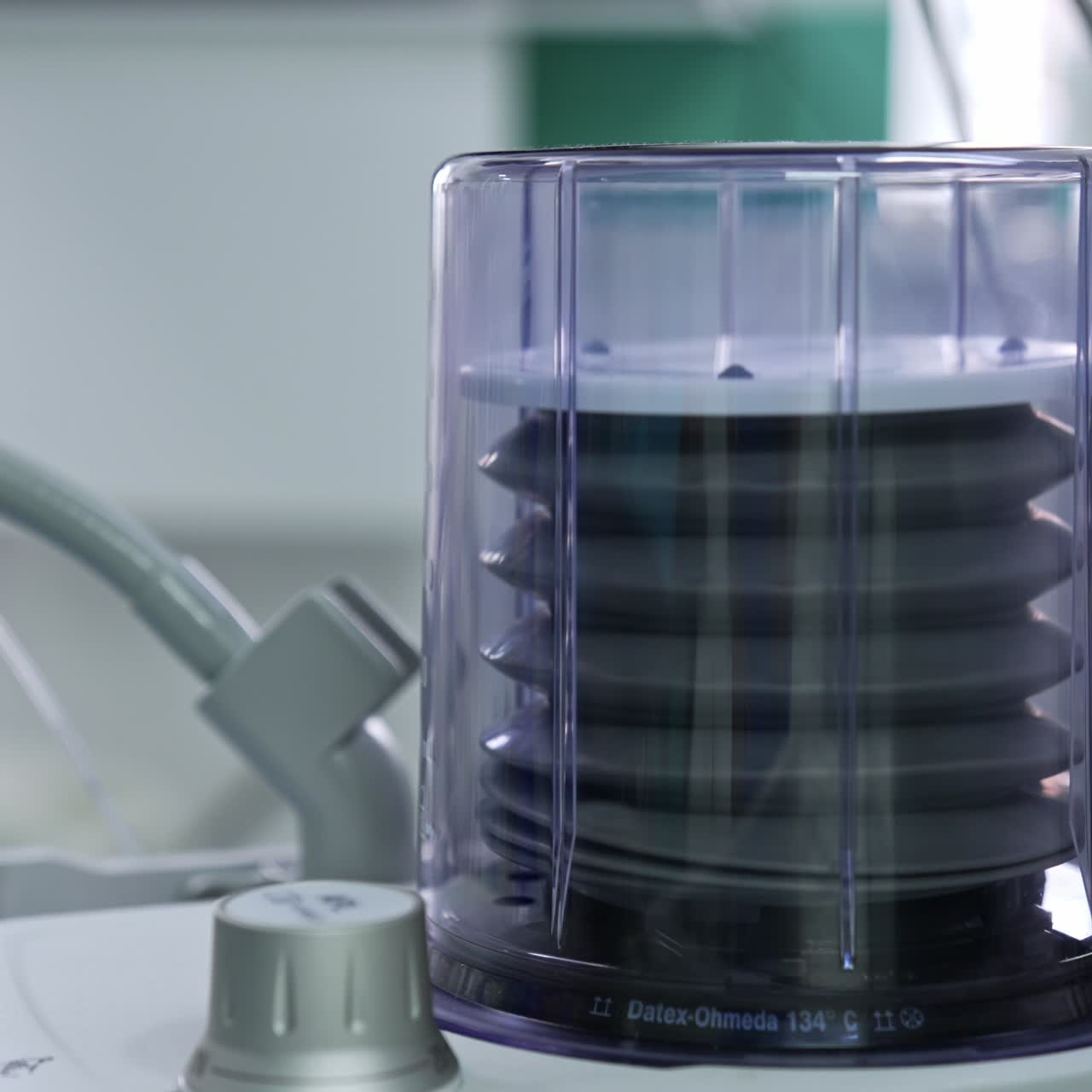 Pump from a lung ventilator working moves up and down. Close up. Artificial respiration for a patient in surgery room