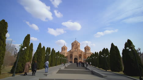 armenian church with people walking in a park