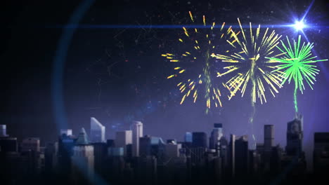 fuegos artificiales explotando y un punto de luz sobre el paisaje urbano contra un fondo azul
