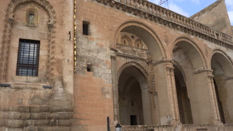 the camera pans right to the magnificent stone-adorned balcony of the şahkulubey mansion in artuklu, the old center of mardin