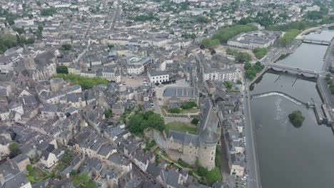 aerial forward top shot drone shot of laval city center, in mayenne, france