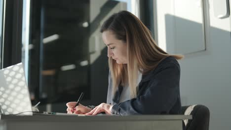 car service manager working at desk in office