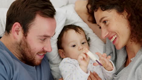 Love,-bed-and-happy-family-bonding-with-baby