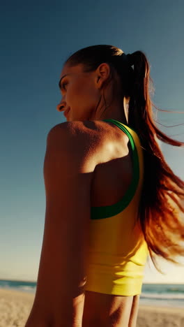 woman in sportswear on the beach