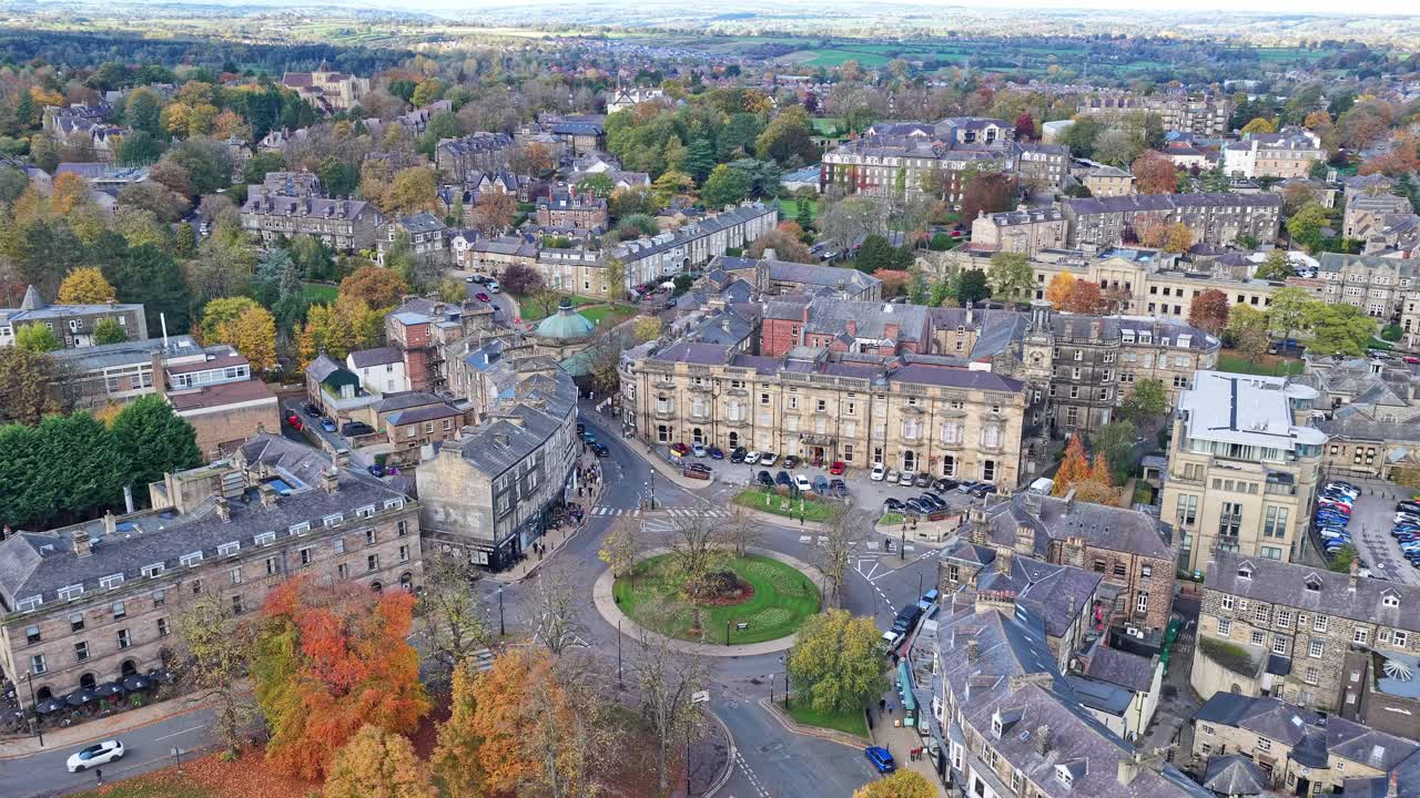 Montpellier Quarter aerial shows Royal Pump Room, landmark roundabout, elegant terraces, residential avenues, and rich autumn foliage in Harrogate centre