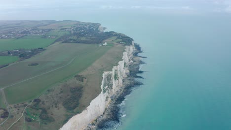 high aerial dolly forward shot of the white cliffs of dover uk