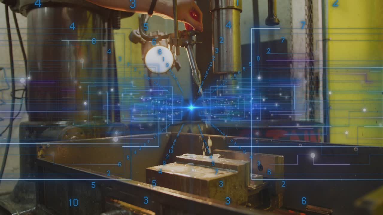 Male operator gripping wheel lowering drill and aligning workpiece in shop HUD guiding for drilling