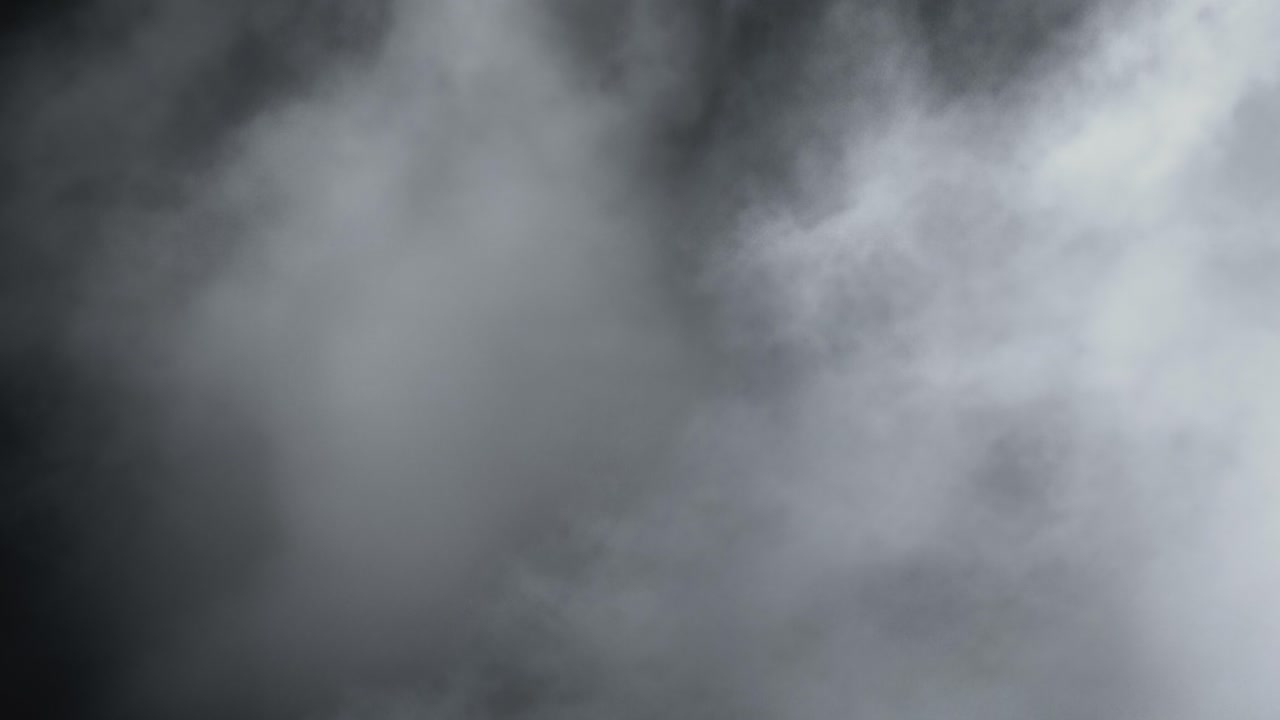 Cinematic 4K slow-motion VFX element of swirling Halloween smoke and fog, forming an eerie, artistic atmosphere filled with mystery, depth, and haunting beauty for cinematic storytelling