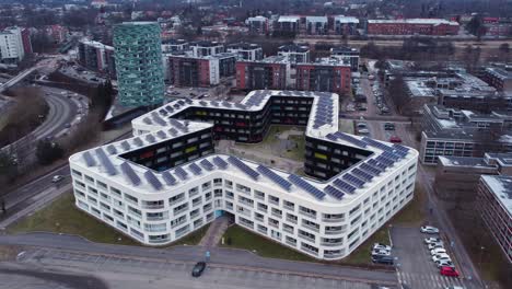 modern angular shaped apartment building in urban environment