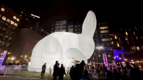 pittsburgh during holidays. a giant 50 foot rabbit in downtown pittsburgh for the city's first night celebrations. pittsburgh downtown market square during christmas holiday season.