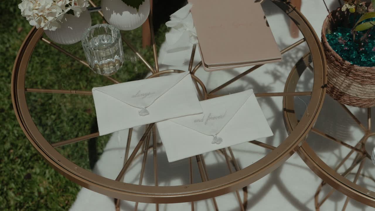 handwritten envelopes with hearts on a sunlit decorative glass table