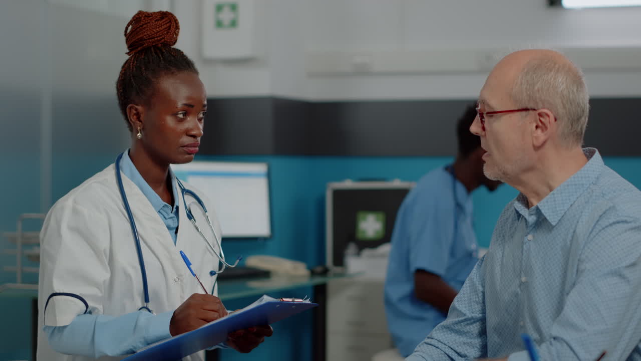 Doctor consulting with patient in clinic