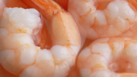 juicy delicious peeled shrimp in sauce, close-up rotate