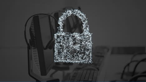 animation of digital padlock over computers in office