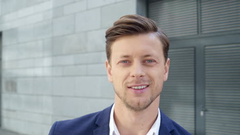 male employee standing on street