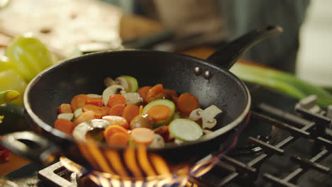 cooking vegetables in a wok