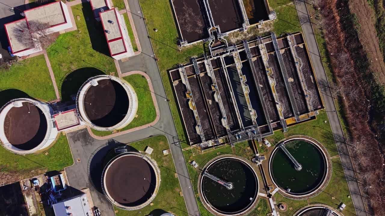 Aerial view shows a water treatment facility in a city